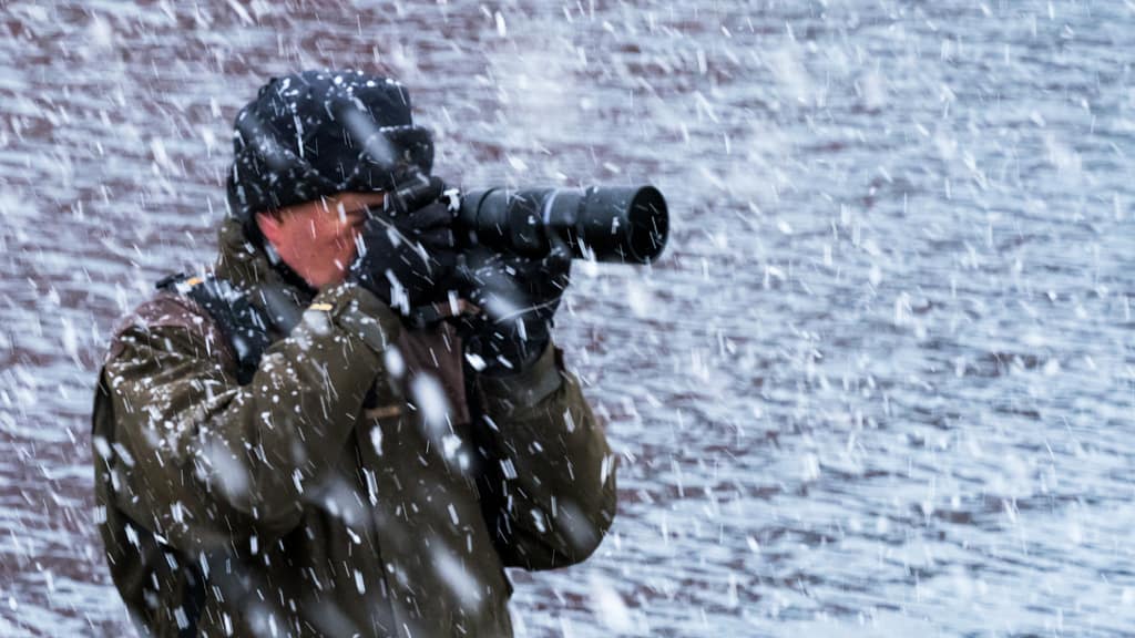 Jari photographing in snowfall