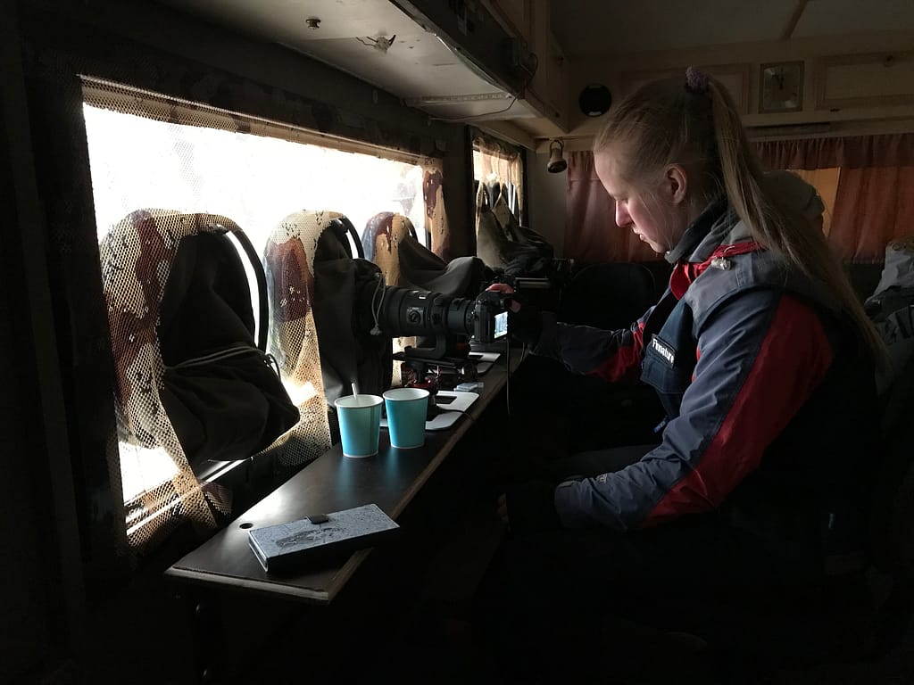 Photographer in heated hide